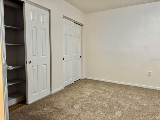 5501 80th St N Unit 509, Saint Petersburg, FL 33709 - unfurnished bedroom with carpet and a closet