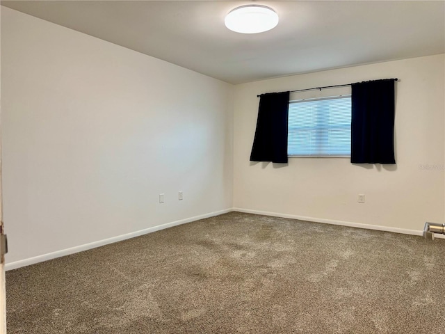 5501 80th St N Unit 509, Saint Petersburg, FL 33709 - spare room with carpet floors and baseboards