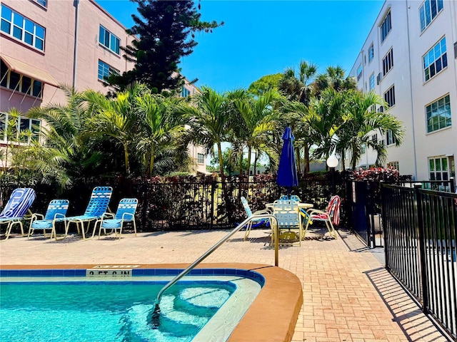 5501 80th St N Unit 509, Saint Petersburg, FL 33709 - view of swimming pool featuring a patio