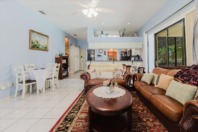11209 Pocket Brook Dr, Tampa, FL 33635 - living area featuring a ceiling fan, visible vents, and light tile patterned floors