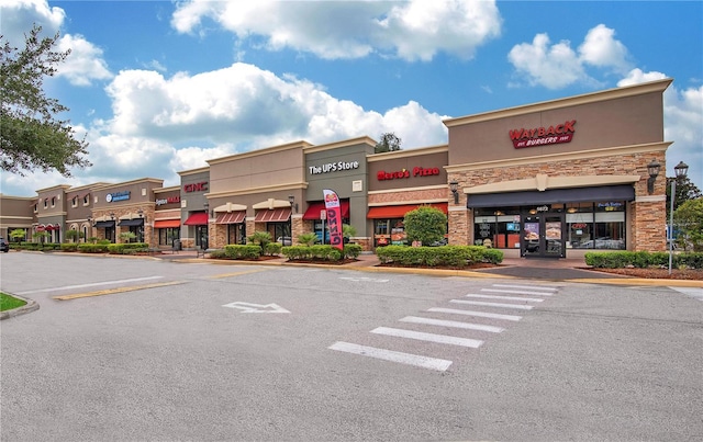 15608 Starling Water Dr, Lithia, FL 33547 - view of property with uncovered parking