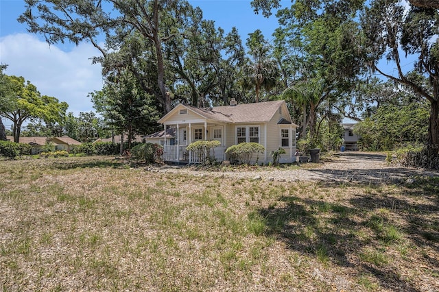 view of home's exterior with a porch