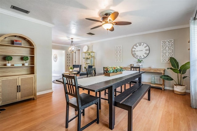 34 Hickory Ln, Safety Harbor, FL 34695 - dining space featuring light wood-type flooring, visible vents, and ceiling fan