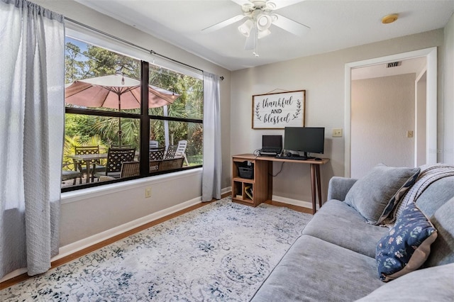 34 Hickory Ln, Safety Harbor, FL 34695 - office with wood finished floors, visible vents, a ceiling fan, and baseboards