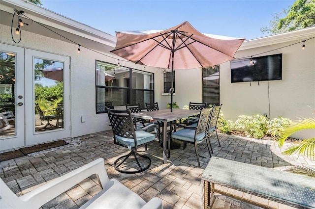 34 Hickory Ln, Safety Harbor, FL 34695 - view of patio with french doors and outdoor dining area