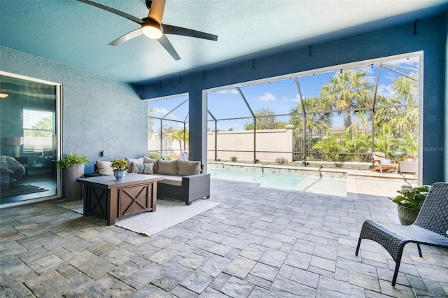 11852 Lake Lucaya Dr, Riverview, FL 33579 - view of patio / terrace with an outdoor living space, ceiling fan, an outdoor pool, and glass enclosure