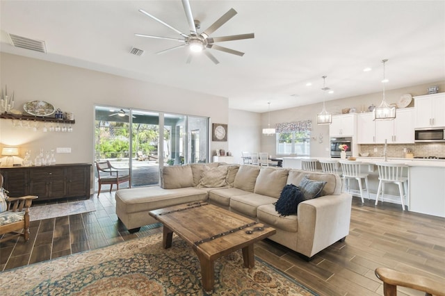 11852 Lake Lucaya Dr, Riverview, FL 33579 - living area featuring ceiling fan, wood finish floors, recessed lighting, and visible vents