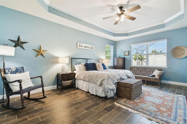 11852 Lake Lucaya Dr, Riverview, FL 33579 - bedroom featuring crown molding, dark wood-style flooring, baseboards, and a raised ceiling
