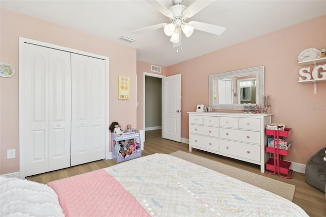 11852 Lake Lucaya Dr, Riverview, FL 33579 - bedroom featuring a closet, light wood finished floors, baseboards, and visible vents