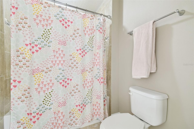 11852 Lake Lucaya Dr, Riverview, FL 33579 - bathroom with toilet and a shower with shower curtain