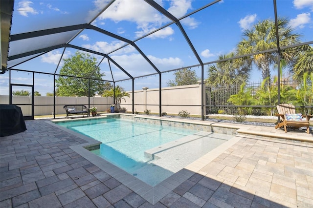 11852 Lake Lucaya Dr, Riverview, FL 33579 - view of pool with a fenced in pool, a fenced backyard, glass enclosure, and a patio area