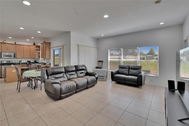 13421 Sydney Rd, Valrico, FL 33594 - living area featuring recessed lighting and light tile patterned floors