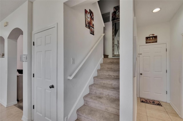 13421 Sydney Rd, Valrico, FL 33594 - stairs featuring visible vents, tile patterned floors, baseboards, and recessed lighting