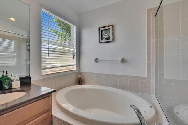 13421 Sydney Rd, Valrico, FL 33594 - bathroom with a garden tub and vanity
