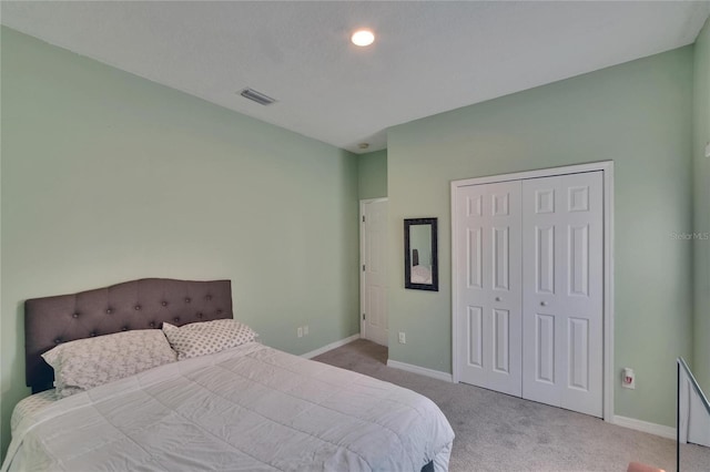 13421 Sydney Rd, Valrico, FL 33594 - carpeted bedroom featuring baseboards, visible vents, and a closet