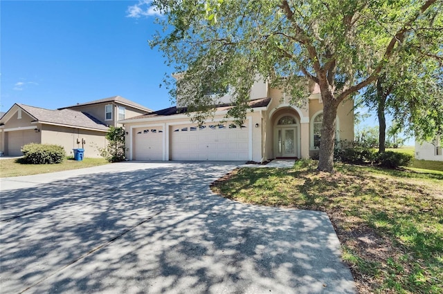 13421 Sydney Rd, Valrico, FL 33594 - view of front facade with concrete driveway, an attached garage, solar panels, and stucco siding