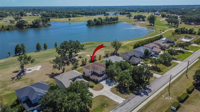 13421 Sydney Rd, Valrico, FL 33594 - drone / aerial view featuring view of golf course, a water view, and a residential view