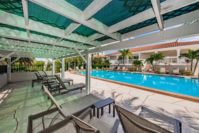 community pool featuring a patio