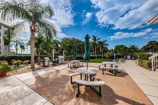 surrounding community featuring a patio area
