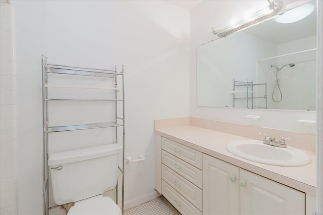 full bath with toilet, tile patterned floors, walk in shower, and vanity