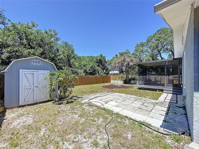 6811 S Himes Ave, Tampa, FL 33611 - view of yard featuring a sunroom and a patio area