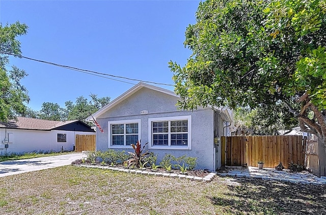 6811 S Himes Ave, Tampa, FL 33611 - view of front of house featuring stucco siding