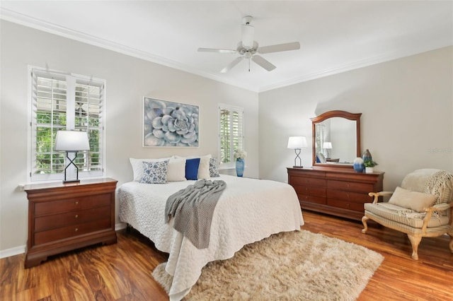 15324 Sherwood Forest Dr, Tampa, FL 33647 - bedroom with wood finished floors, crown molding, ceiling fan, and baseboards