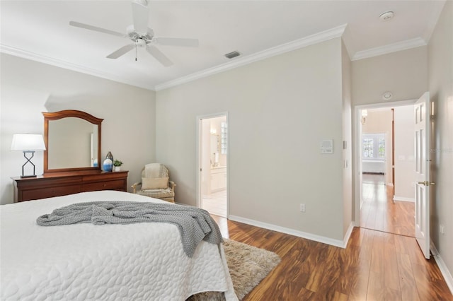 15324 Sherwood Forest Dr, Tampa, FL 33647 - bedroom with wood finished floors, ornamental molding, baseboards, ensuite bath, and ceiling fan