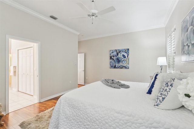 15324 Sherwood Forest Dr, Tampa, FL 33647 - bedroom featuring ornamental molding, wood finished floors, a ceiling fan, and baseboards