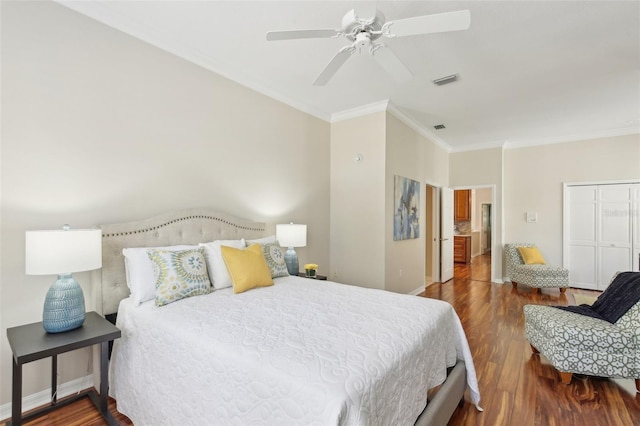 15324 Sherwood Forest Dr, Tampa, FL 33647 - bedroom with ornamental molding, wood finished floors, baseboards, and a ceiling fan