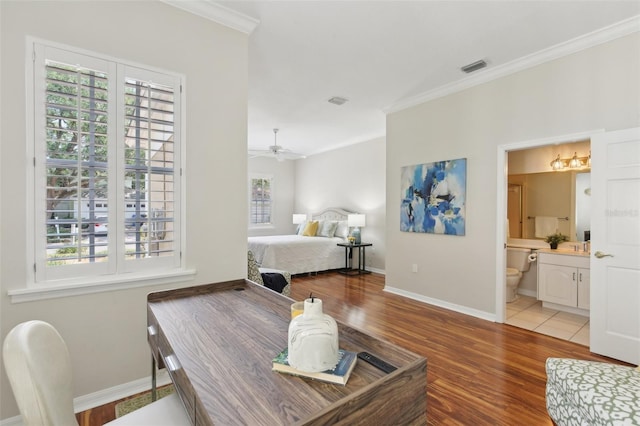 15324 Sherwood Forest Dr, Tampa, FL 33647 - bedroom featuring ornamental molding, baseboards, light wood-style floors, and connected bathroom