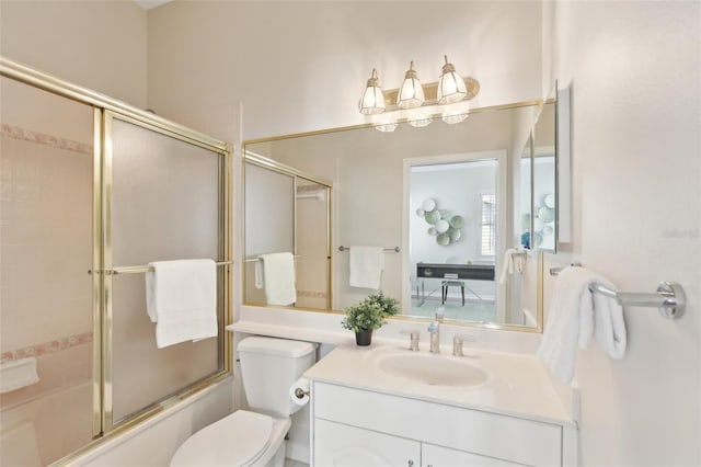15324 Sherwood Forest Dr, Tampa, FL 33647 - bathroom with shower / bath combination with glass door, toilet, and vanity