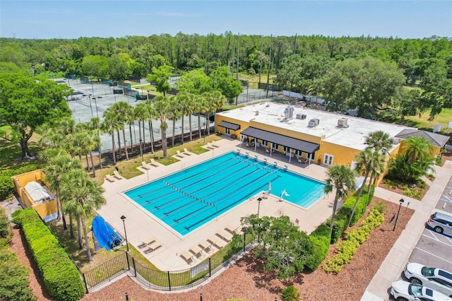 15324 Sherwood Forest Dr, Tampa, FL 33647 - community pool featuring fence and a forest view