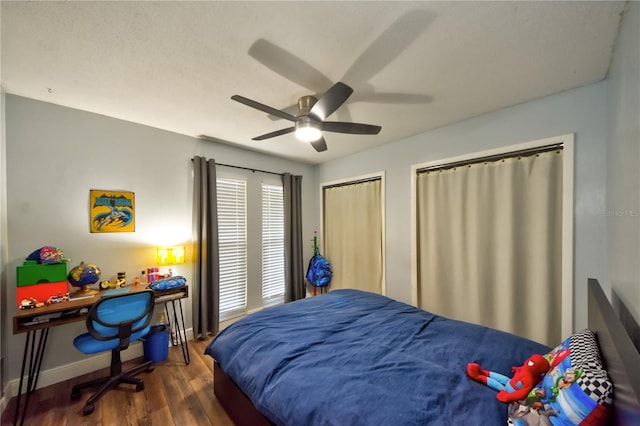 12532 115th St, Largo, FL 33778 - bedroom featuring a ceiling fan, wood finished floors, and baseboards