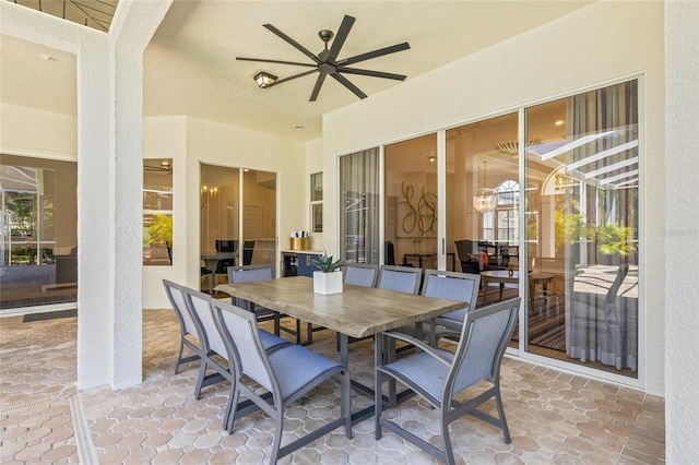 view of patio / terrace featuring ceiling fan