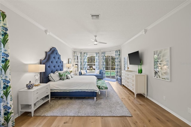 bedroom with baseboards, access to outside, light wood-style floors, and ornamental molding