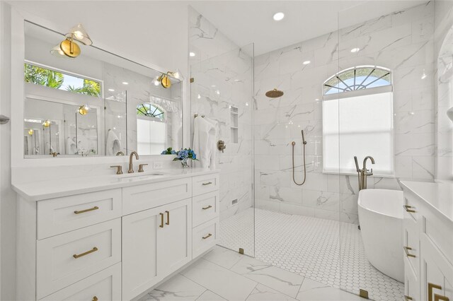 bathroom featuring a wealth of natural light, marble finish floor, vanity, and a marble finish shower