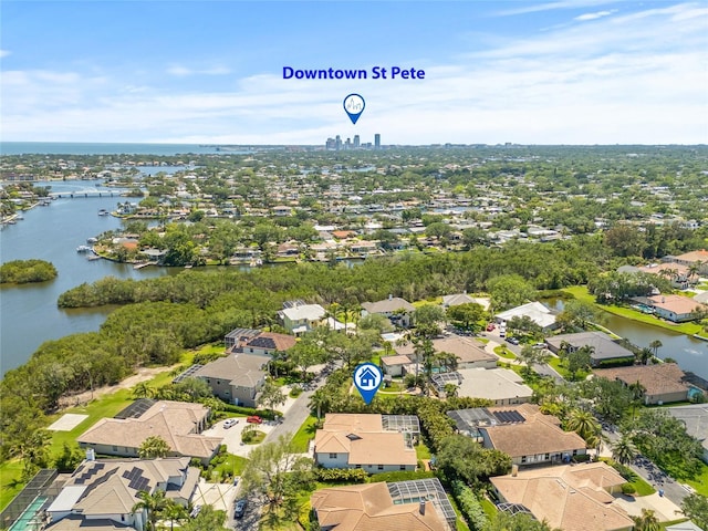 aerial view with a residential view and a water view