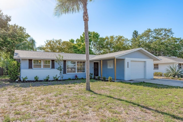 10137 Oleander Dr, Port Richey, FL 34668 - single story home featuring an attached garage, a front lawn, and concrete driveway