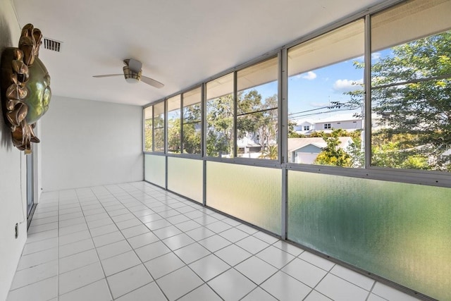 500 Glennes Ln Unit 205, Dunedin, FL 34698 - unfurnished sunroom featuring plenty of natural light, a ceiling fan, and visible vents