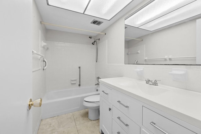 500 Glennes Ln Unit 205, Dunedin, FL 34698 - full bath with vanity, shower / tub combination, toilet, tile patterned flooring, and visible vents
