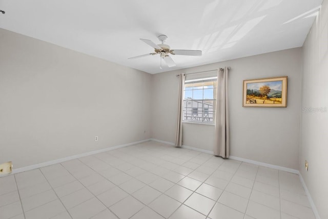 500 Glennes Ln Unit 205, Dunedin, FL 34698 - unfurnished room with ceiling fan, baseboards, and light tile patterned flooring