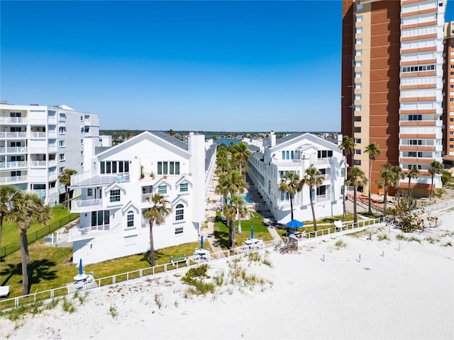17960 Gulf Blvd Unit 111, Redington Shores, FL 33708 - view of building exterior with fence