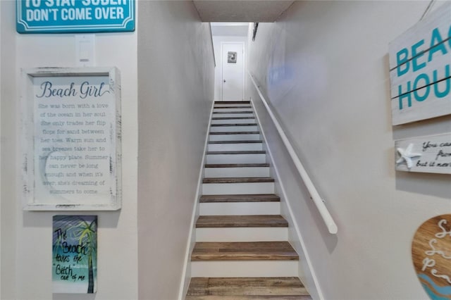 17960 Gulf Blvd Unit 111, Redington Shores, FL 33708 - stairway with wood finished floors