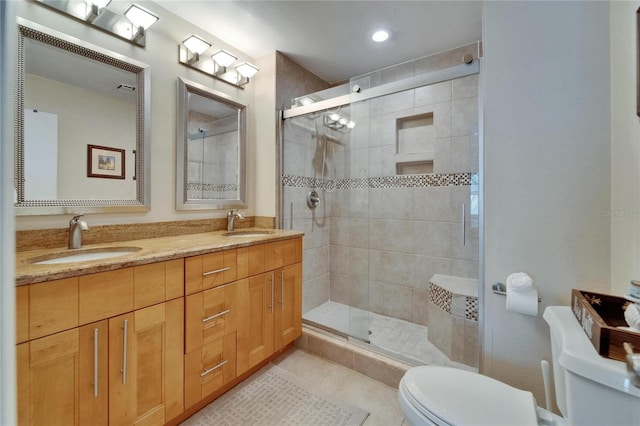17960 Gulf Blvd Unit 111, Redington Shores, FL 33708 - bathroom with a sink, tile patterned floors, a shower stall, and toilet