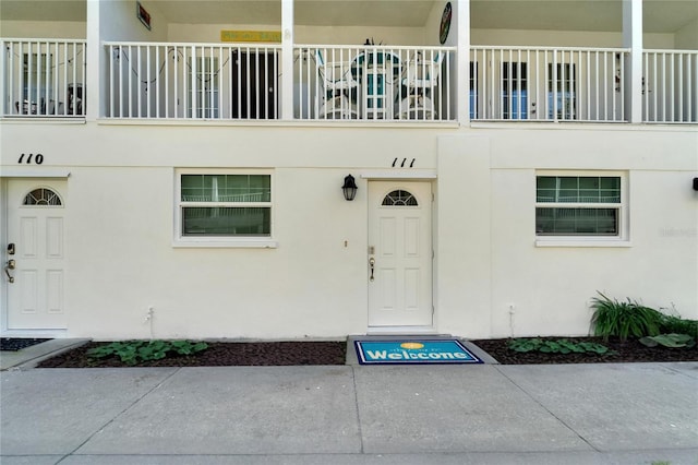 17960 Gulf Blvd Unit 111, Redington Shores, FL 33708 - property entrance featuring stucco siding