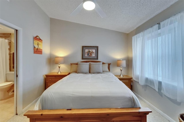 17960 Gulf Blvd Unit 111, Redington Shores, FL 33708 - bedroom featuring a ceiling fan, a textured ceiling, carpet, and lofted ceiling