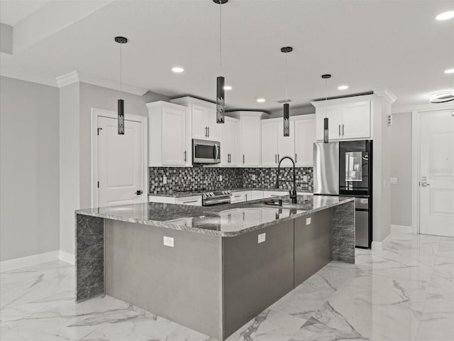 kitchen featuring marble finish floor, dark stone counters, stainless steel appliances, baseboards, and recessed lighting