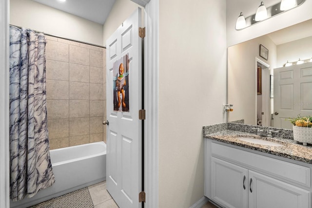 full bath with vanity, tile patterned flooring, and shower / tub combo