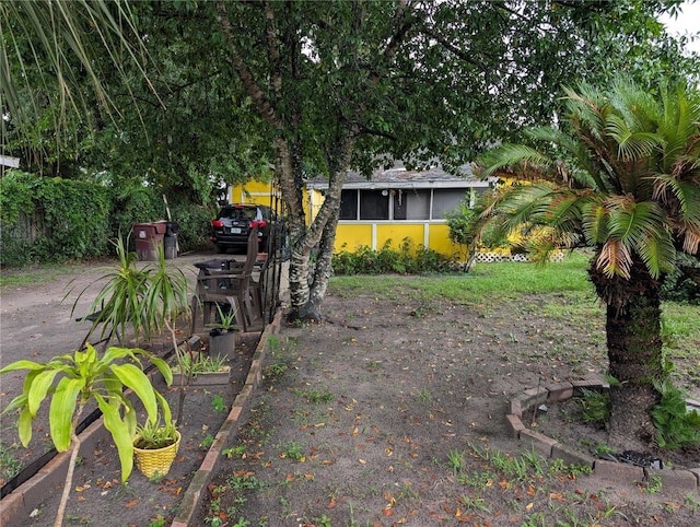 730 Citrus St, Orlando, FL 32805 - view of yard featuring a sunroom